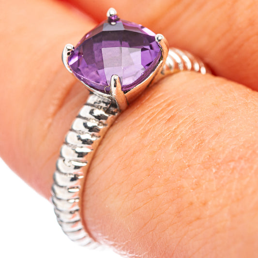 Amethyst oval gemstone ring with prong-set purple stone and twisted .925 sterling silver band