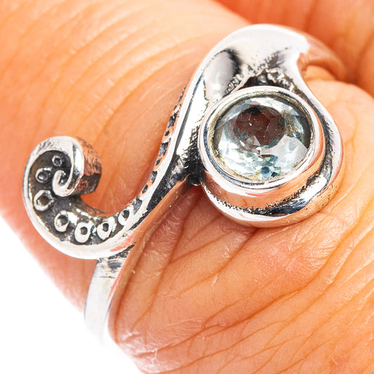 Sterling silver wave dainty ring with blue gemstone oval bezel setting