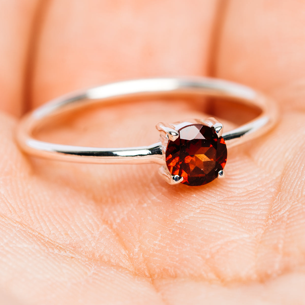Garnet stackable ring, .925 sterling silver, size 9.5, round gemstone with four prongs