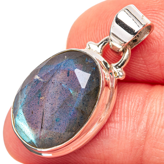 Faceted labradorite pendant in .925 sterling silver oval bezel, with hinged bail