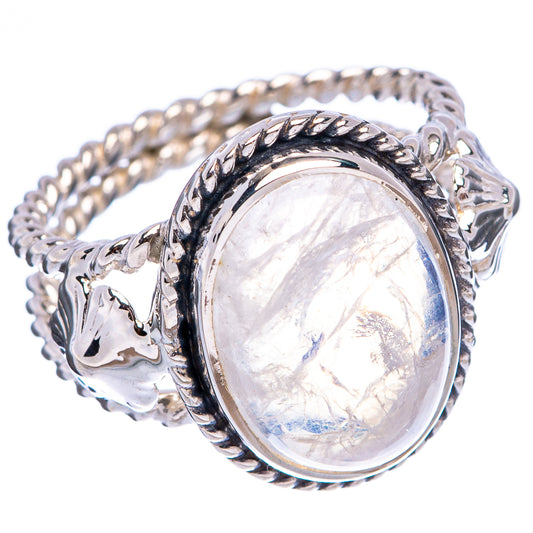 Oval moonstone ring in .925 sterling silver with filigree bezel and textured band