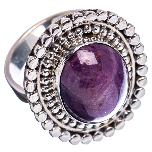 Sterling silver star ruby ring with round beaded edge and oval purple gemstone