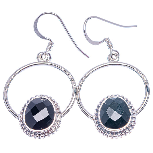 Sterling silver hoop earrings with black oval faceted stone and beaded outer edge