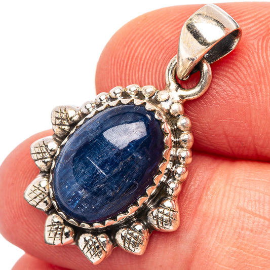 Sterling silver kyanite pendant with oval blue stone and beaded leaf-like rim
