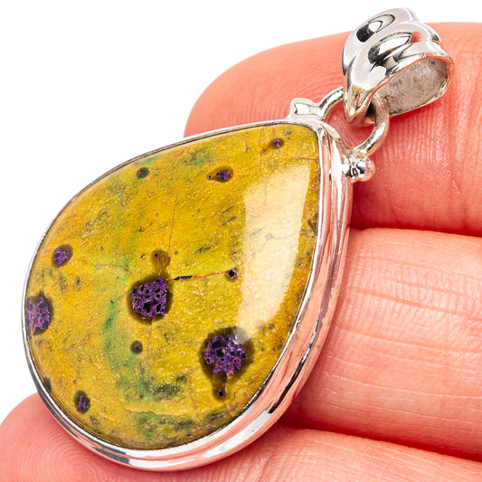 Sterling silver teardrop pendant with yellow stone, purple speckles and green patches
