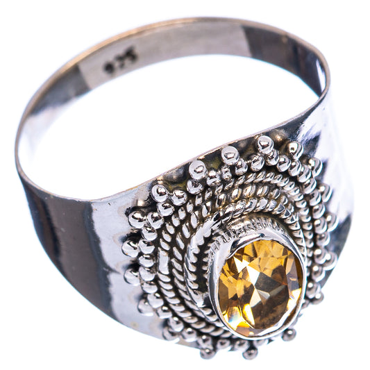 Sterling silver citrine ring, side view with oval gemstone and decorative halo