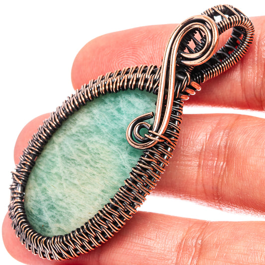 Oxidized copper wire-wrap pendant with oval green amazonite and spiral bail