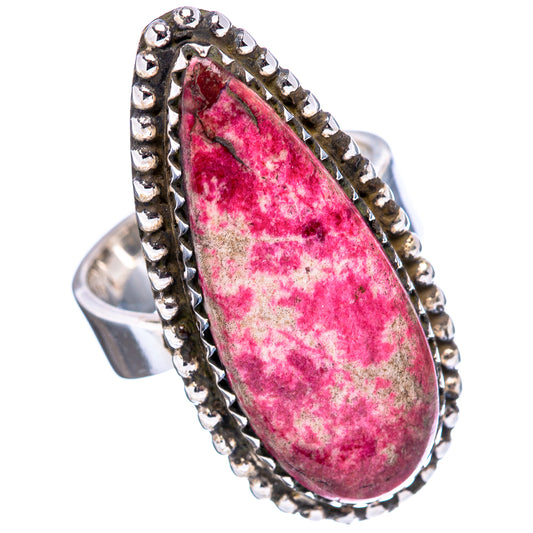 Adjustable sterling silver ring with pink teardrop thulite stone and beaded border