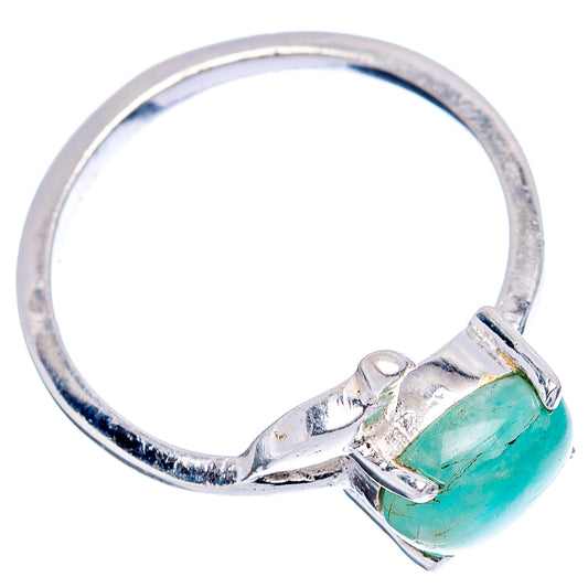 Sterling silver bird ring with oval teal-green stone, open side profile