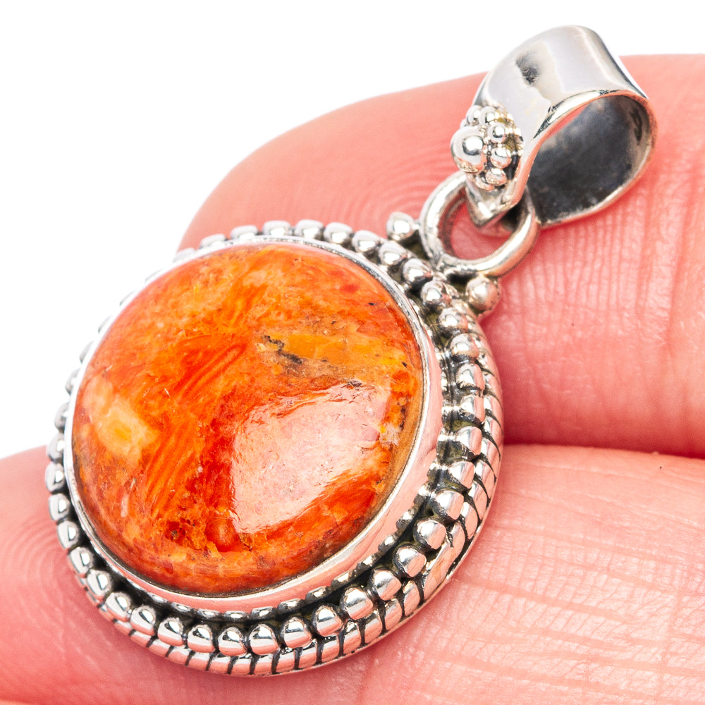 Sponge coral pendant in oval bezel of 925 sterling silver with loop bail