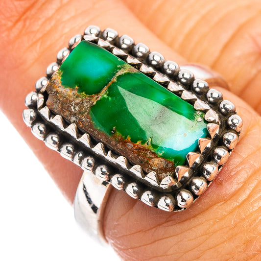 Sterling silver turquoise ring with rectangular green stone in beaded bezel