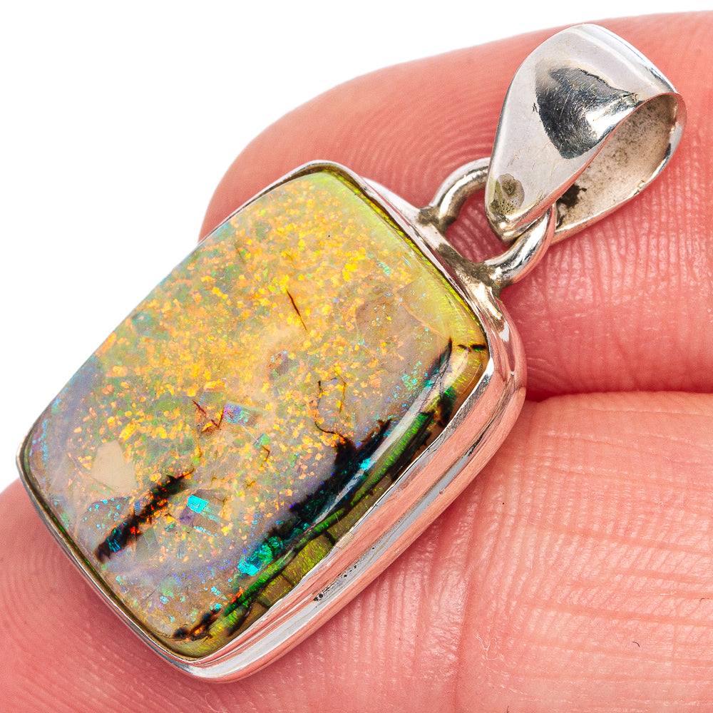 Sterling silver opal pendant with square bezel, orange-yellow iridescent stone