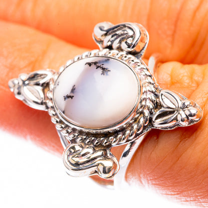 Oval dendritic opal cabochon silver ring with ornate floral filigree