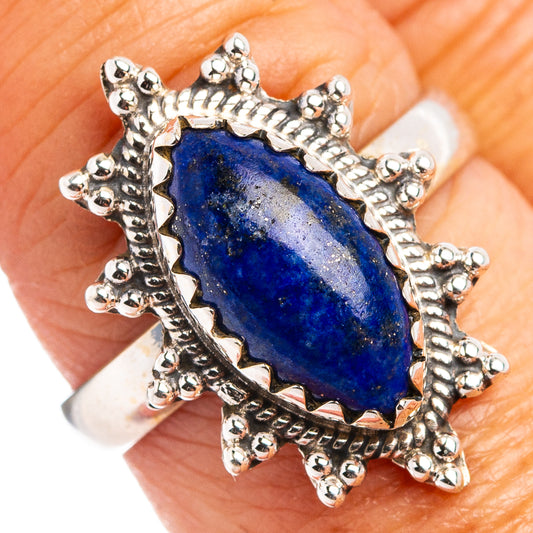 Lapis lazuli oval ring in .925 sterling silver with ornate beaded halo