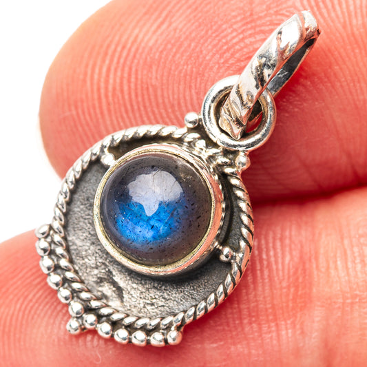 Sterling silver labradorite pendant with oval blue stone and twisted rope bezel