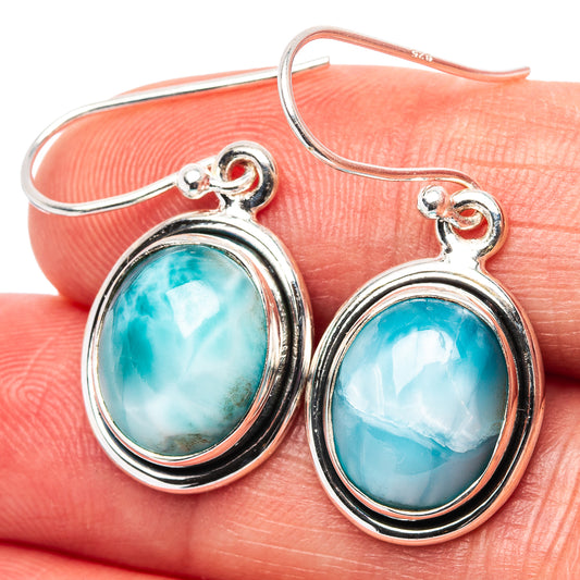 Larimar earrings in .925 sterling silver with oval blue-green stones and small red accents