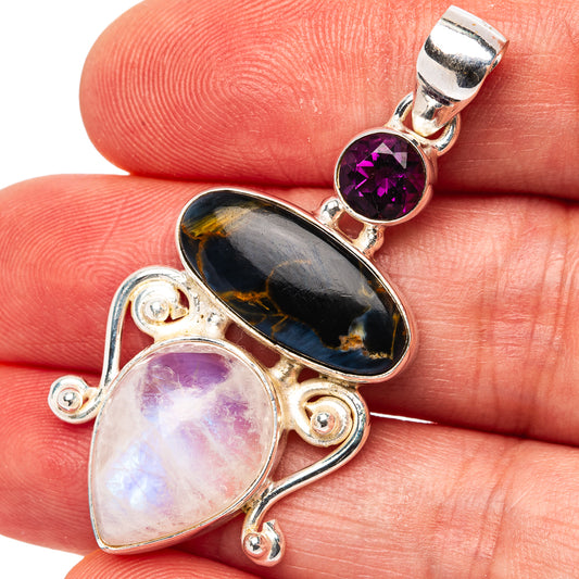 Sterling silver pendant with purple amethyst, dark pietersite, and iridescent moonstone