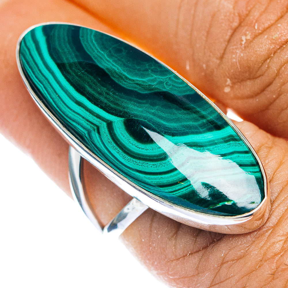 Malachite cabochon ring with oval green stone and .925 sterling silver band