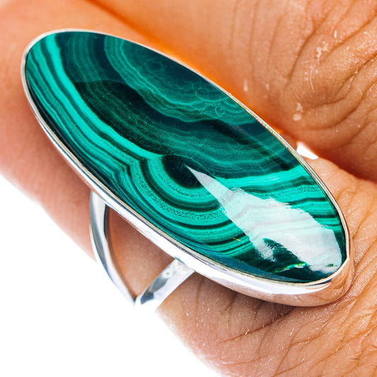 Malachite cabochon ring with oval green stone and .925 sterling silver band