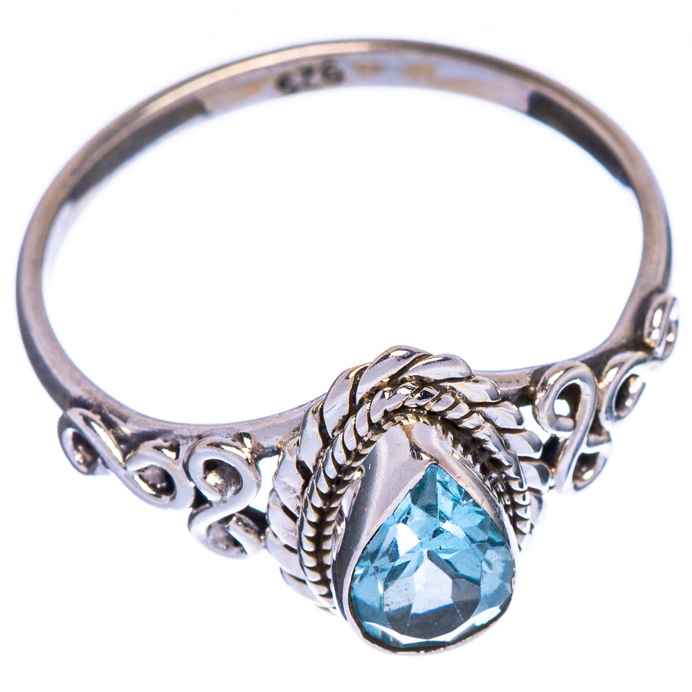 Sterling silver dainty ring with blue teardrop gemstone and braided side details