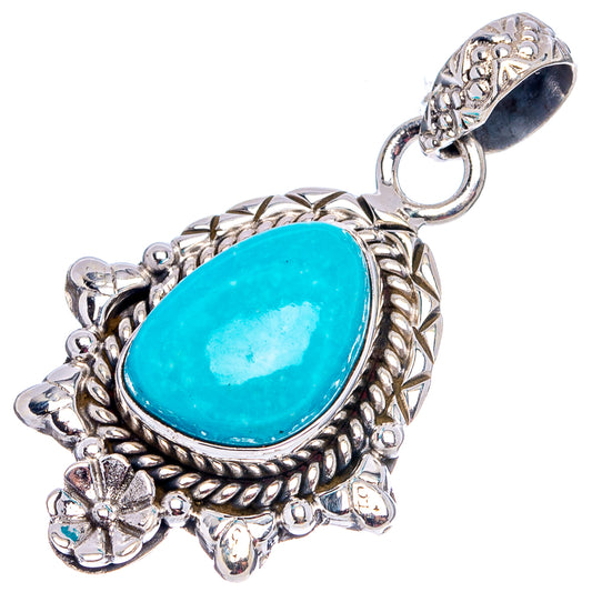 Turquoise oval pendant with detailed .925 sterling silver bezel and top loop