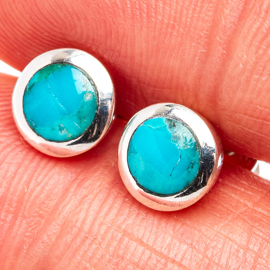 Turquoise oval stud earrings in .925 sterling silver with silver bezel settings