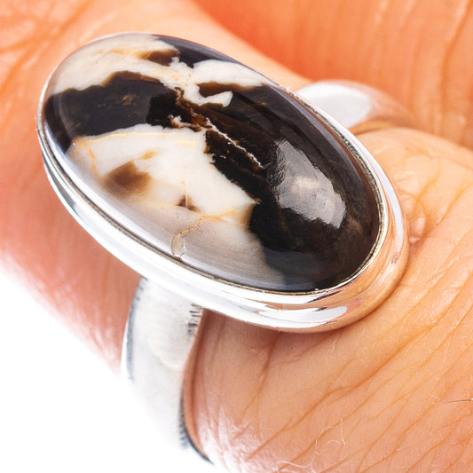 Sterling silver ring with oval peanut wood jasper cabochon, black and cream pattern
