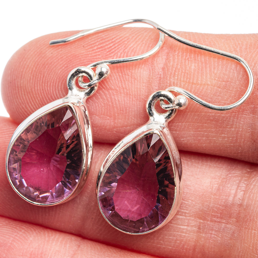 Faceted teardrop earrings in sterling silver with purple-pink gemstone drops