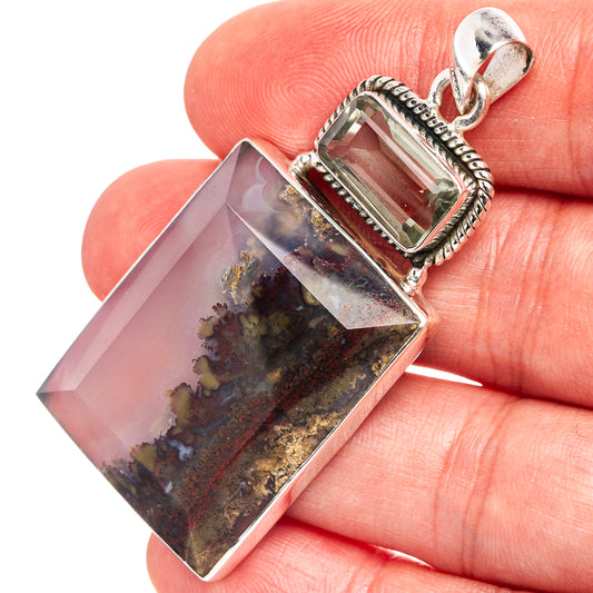 Sterling silver pendant with rectangular plume agate and faceted inset bail