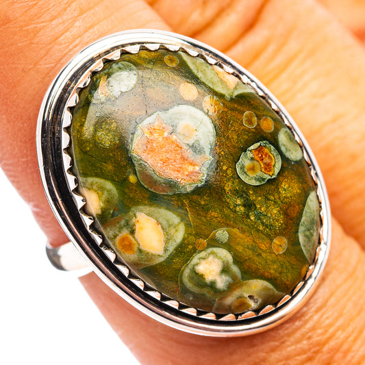 Sterling silver ring, size 7.75, with oval green-and-orange rhyolite in bezel