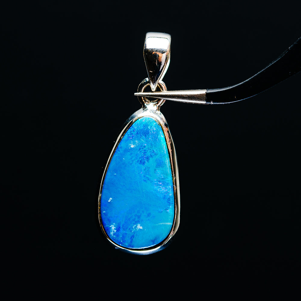 Sterling silver pendant with teardrop blue fire opal and raised bail