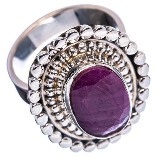 Sterling silver ring with oval purple gemstone, textured beaded band and halo