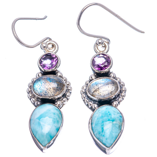 Pair of sterling silver drop earrings: amethyst round top, blue stones, and teardrop larimar
