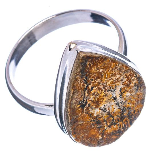 Sterling silver ring with round band and teardrop cabochon in amber and dark dendrite