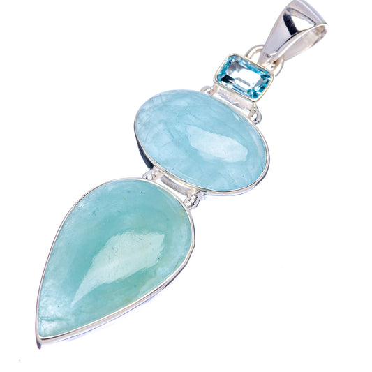 Sterling silver double-stone pendant with two light-blue teardrop gemstones