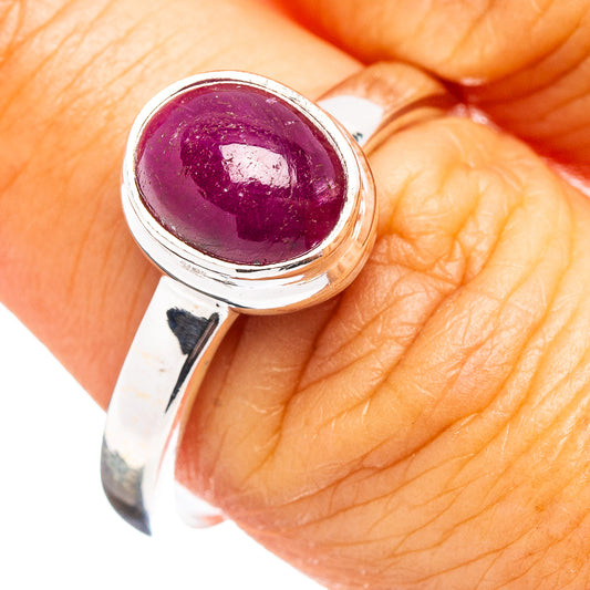 Oval ruby cabochon sterling silver ring with polished band