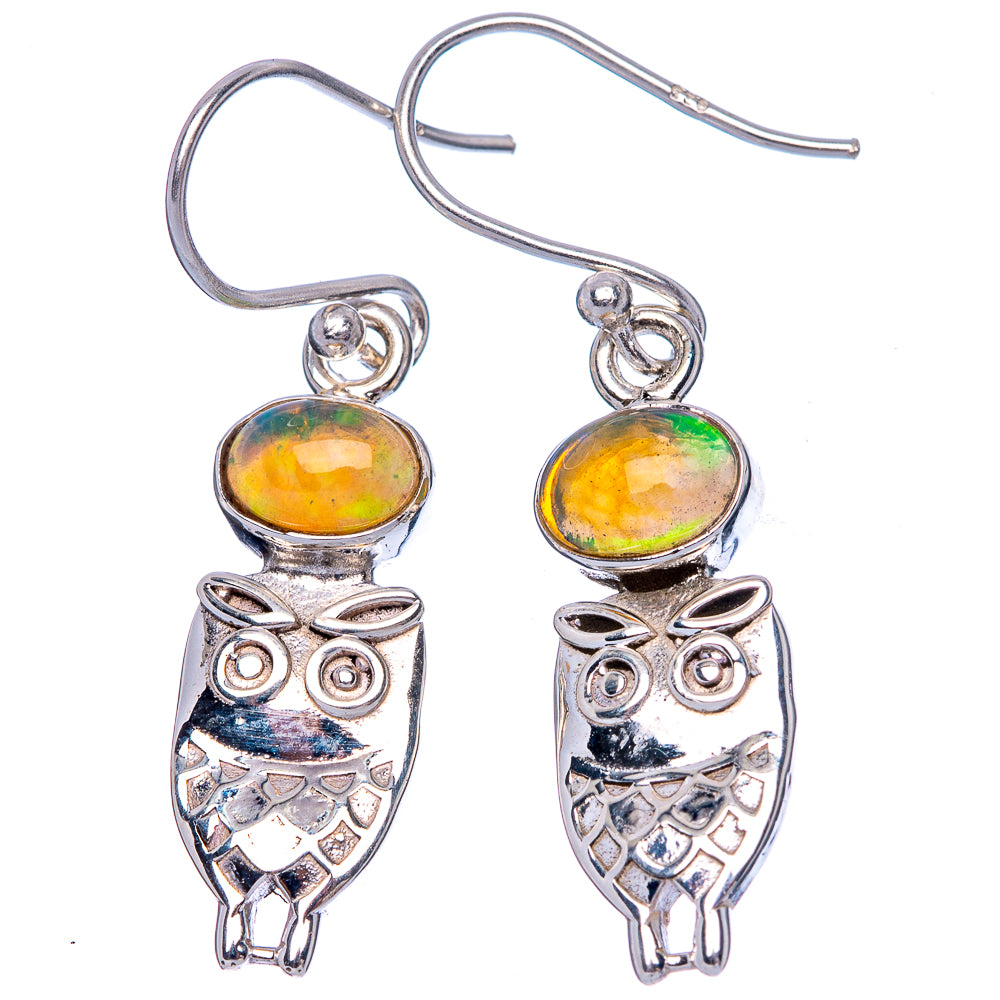 Sterling silver owl dangle earrings with oval opal-style stones