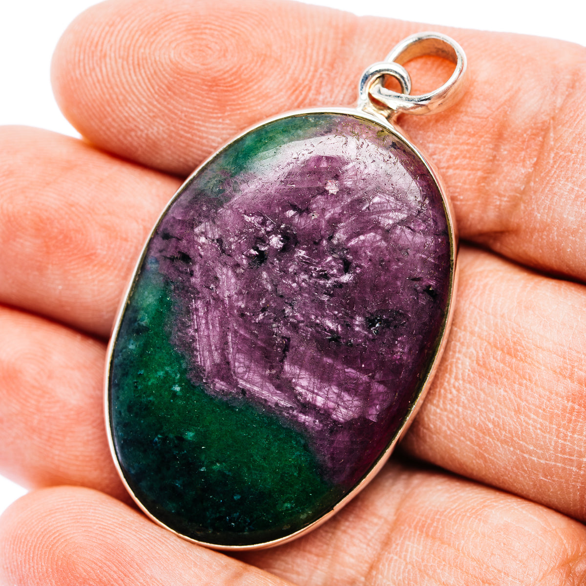 Sterling silver oval pendant with purple and green gemstone cabochon