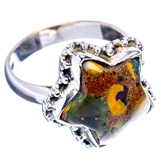 Sterling silver ring with starburst jasper on raised bezel, openwork sides