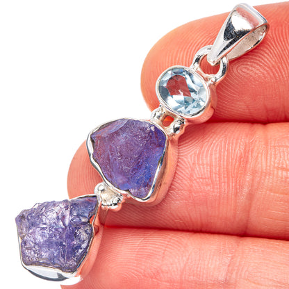 Rough tanzanite and blue topaz pendant in polished 925 sterling silver bezel
