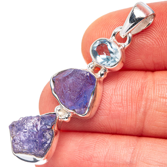 Rough tanzanite and blue topaz pendant in polished 925 sterling silver bezel