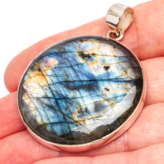 Labradorite pendant in .925 sterling silver, oval cabochon with blue and gold shimmer
