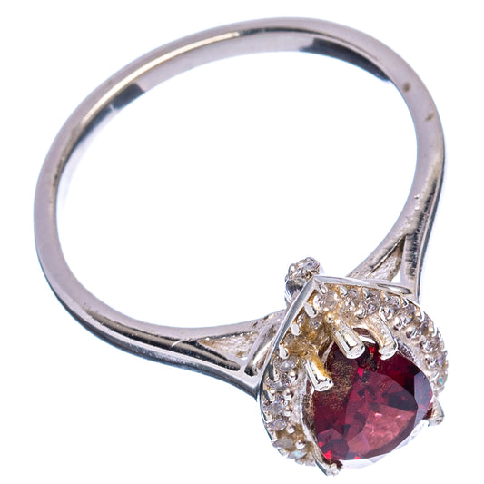 Sterling silver ring, size 7, with red marquise stone in prongs and zirconia halo