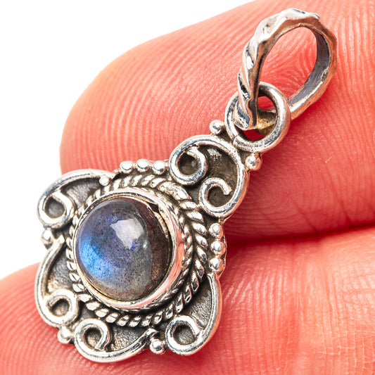 Sterling silver labradorite pendant with oval blue flash stone and ornate leaf filigree