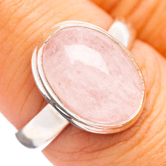Oval pink kunzite stone in sterling silver bezel ring, close-up; size 7.25