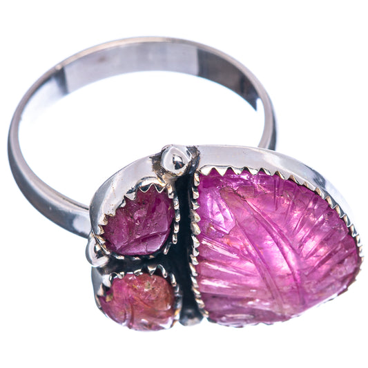 Sterling silver ruby ring with teardrop pink-red carved stones and black accent prongs