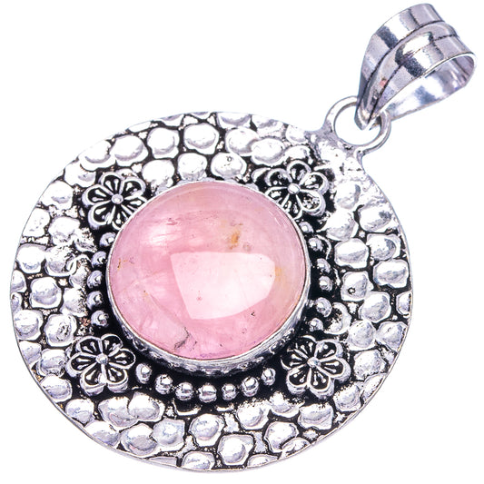 Round rose quartz pendant with pink cabochon, ornate filigree German-silver bezel