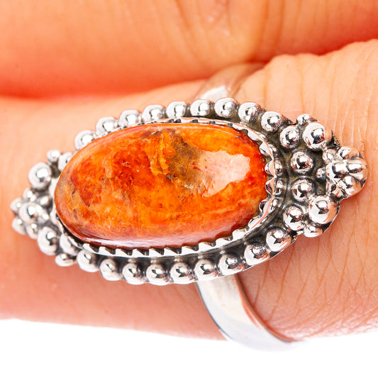 Oval sponge coral ring in .925 sterling silver with beaded bezel and edge