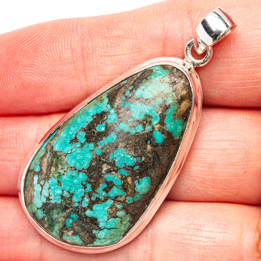Teardrop turquoise pendant in .925 sterling silver with turquoise stone and silver loop bail