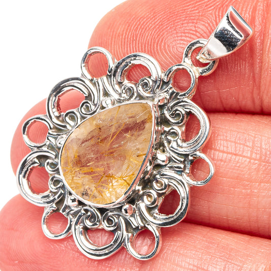 Sterling silver teardrop rutilated quartz pendant with ornate filigree bezel, yellow-gold stone